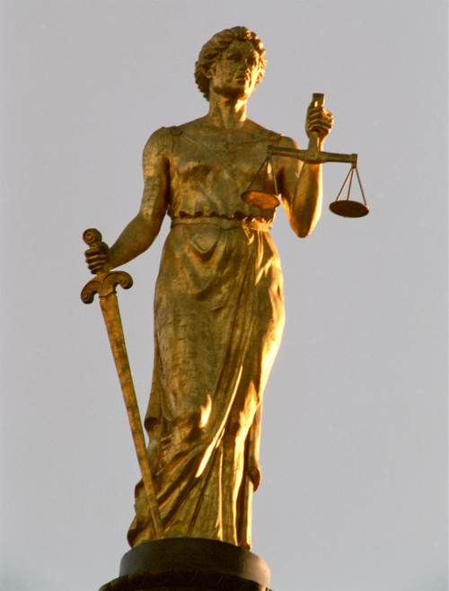 This Lady Justice statue stood atop the cupola of the Appellate Division, 2nd Dept.’s original home, Brooklyn Borough Hall, until an 1895 fire knocked it down. It was restored back to its original location nearly a century later, in the 1980s.